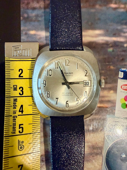 Montre Orano NOS Swiss Made Automatique day date vintage