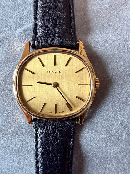 Montre Orano NOS Suisse tonneau plaqué or 70s ultra fine