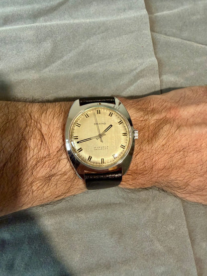 Montre Orano NOS Suisse 17 rubis incabloc cadran beige texturé