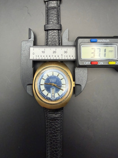 Montre Orano NOS Swiss Made Automatique day date bleue vintage plaqué or