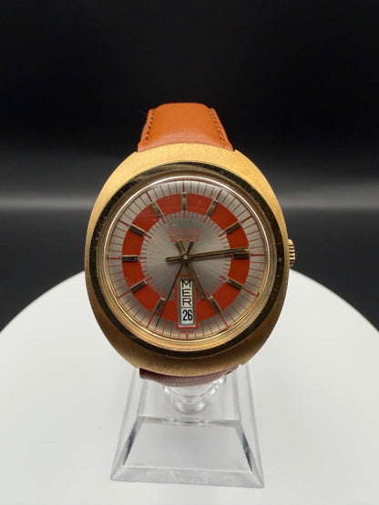 Montre Orano NOS Swiss Made Automatique day date rouge vintage plaqué or