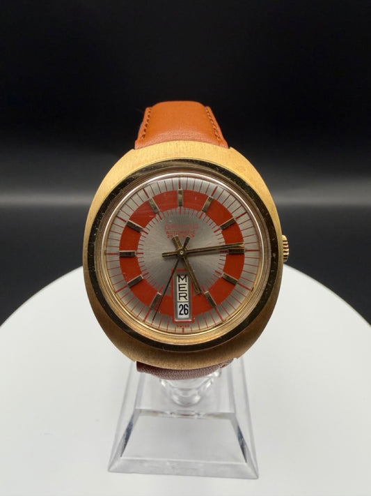 Montre Orano NOS Swiss Made Automatique day date rouge vintage plaqué or