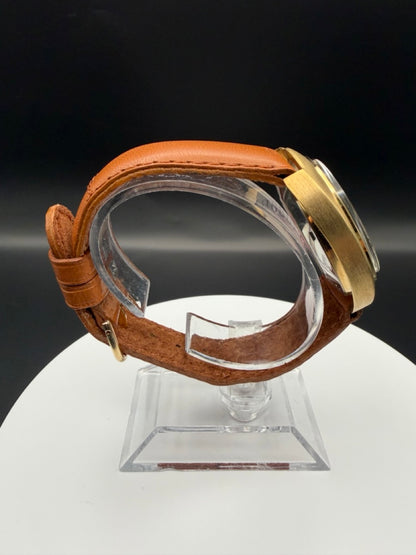 Montre Orano NOS Swiss Made Automatique day date rouge vintage plaqué or