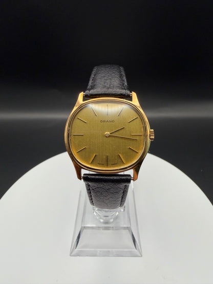 Montre Orano NOS Suisse tonneau plaqué or 70s ultra fine