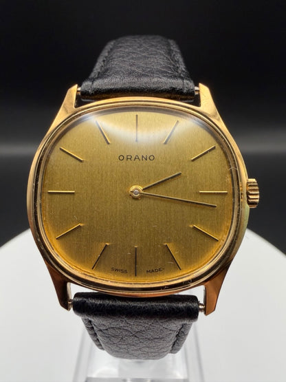 Montre Orano NOS Suisse tonneau plaqué or 70s ultra fine