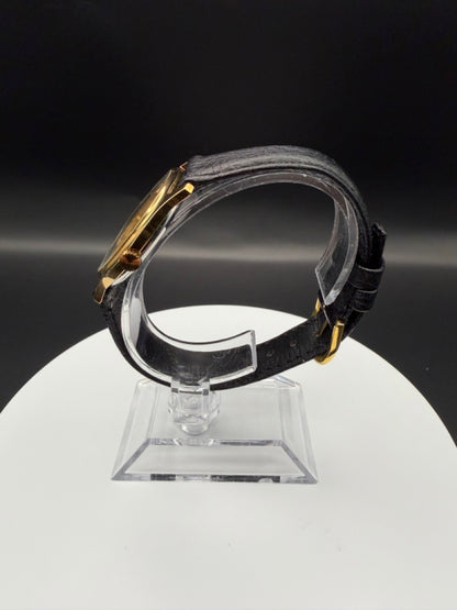 Montre Orano NOS Suisse tonneau plaqué or 70s ultra fine