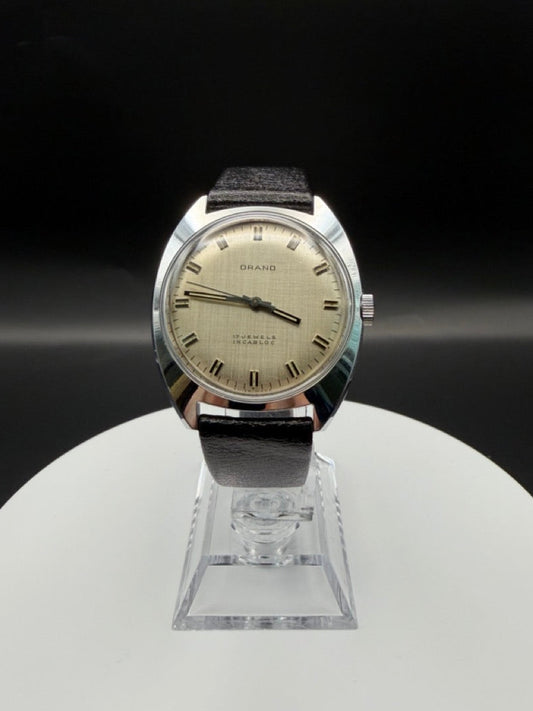 Montre Orano NOS Suisse 17 rubis incabloc cadran beige texturé