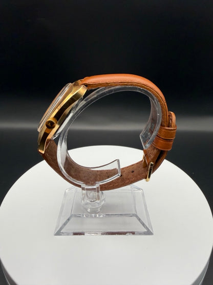 Montre Orano NOS Swiss Made Automatique doré bracelet marron