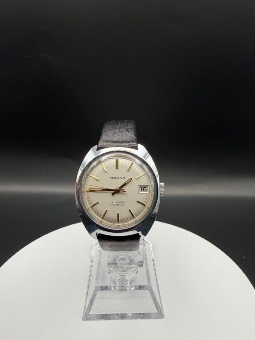 Montre Orano NOS Swiss Made Automatique Boitier silver, cadran clair et aiguilles dorées