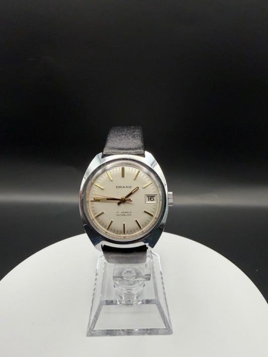 Montre Orano NOS Swiss Made Automatique Boitier silver, cadran clair et aiguilles dorées