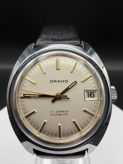 Montre Orano NOS Swiss Made Automatique Boitier silver, cadran clair et aiguilles dorées