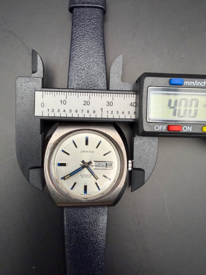 Montre Orano NOS Swiss Made Automatique silver brut vintage