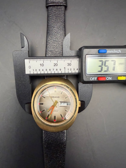 Montre Orano NOS Swiss Made Automatique day date rond 2 vintage plaqué or