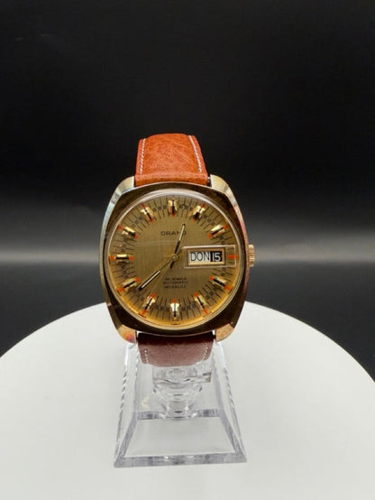 Montre Orano NOS plaqué or Automatique day date vintage