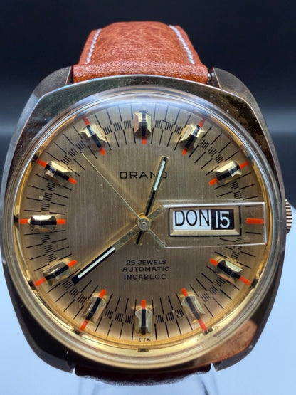 Montre Orano NOS plaqué or Automatique day date vintage