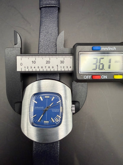 Montre Orano NOS Swiss Made Automatique day date cadran bleu vintage