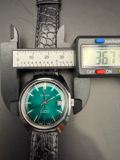 Montre Orano NOS Swiss Made Vert émeraude vintage