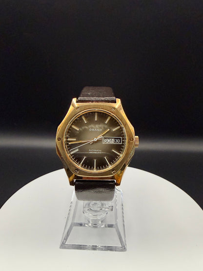 Montre Orano NOS Suisse octogonale automatique cadran beige marron patiné