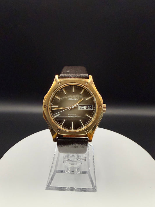 Montre Orano NOS Suisse octogonale automatique cadran beige marron patiné