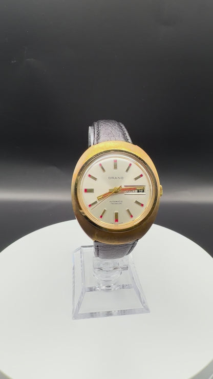 Montre Orano NOS Swiss Made Automatique day date vintage aiguilles rouges