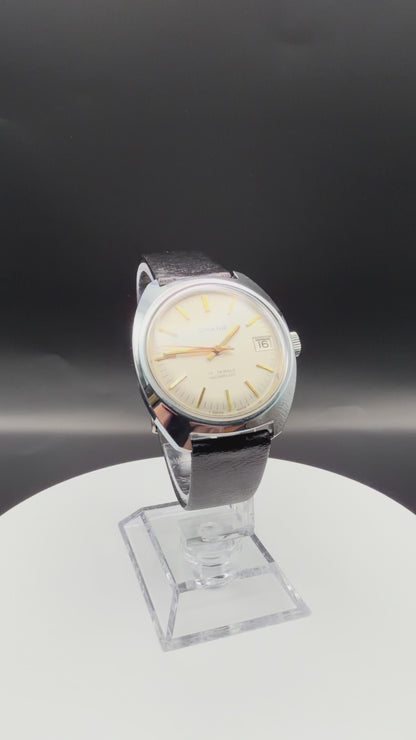 Montre Orano NOS Swiss Made Automatique Boitier silver, cadran clair et aiguilles dorées