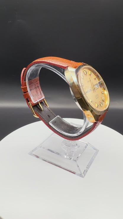 Montre Orano NOS plaqué or Automatique day date vintage